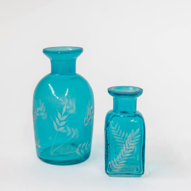 Bleu vif avec bouteille décorative à imprimé feuille blanche