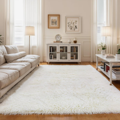 Tapis blanc crème KCHOWUA pour chambre de filles, tapis pelucheux lavable à la machine de 3 pi x 5 pi pour le salon, tapis à poils longs doux pour chambre d'enfant, ivoire
