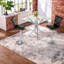 Ensemble de bar moderne avec tabourets réglables en chrome et table en verre pour petites cuisines