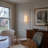 2-Light Gold Wall Sconce With Textured Clear Floral Glass Shades-1393488358