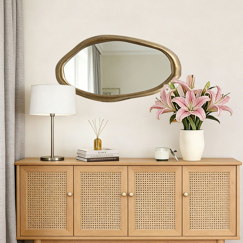 Elegant Wall Mirror with Curved Frame, Aged Gold Finish, Modern Accent Decor, 29.5"x15.25"