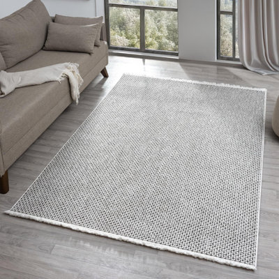 Tapis texturé à franges