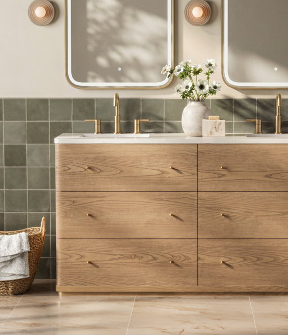 Bathroom with double sink vanity and muted-gold fixtures.