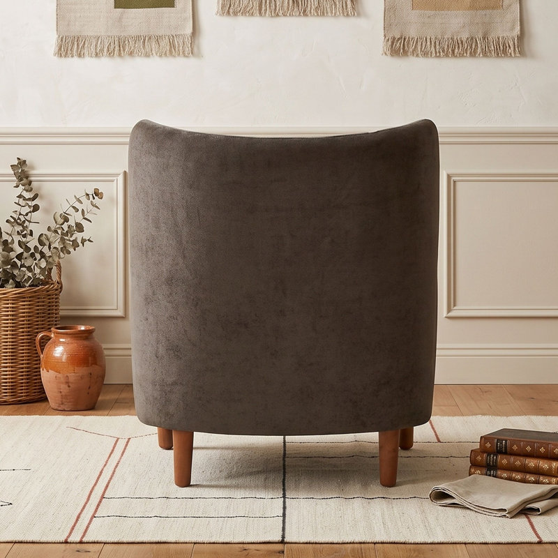 Fauteuil club à oreilles rembourré