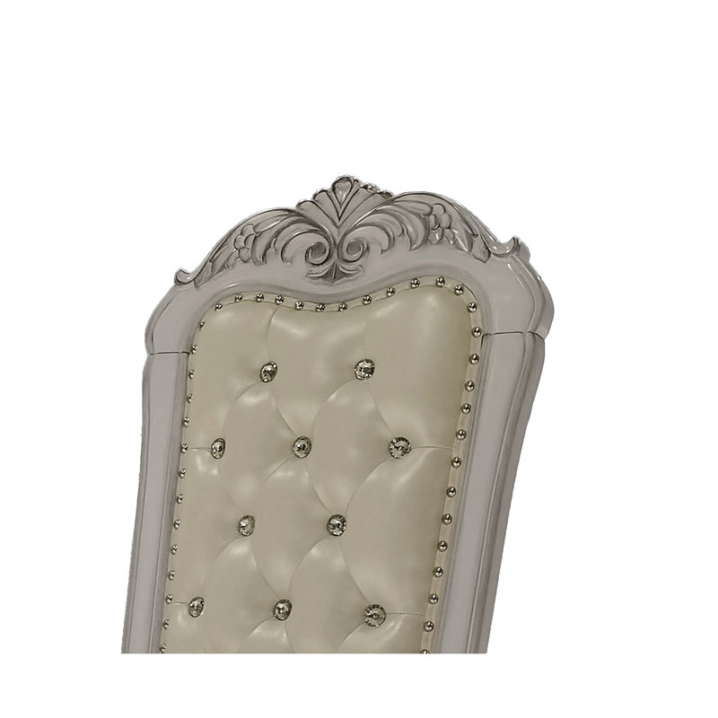 Ensemble de 2 fauteuils capitonnés ivoire et blanc os