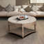 Table basse ronde avec repose-pieds-546053374