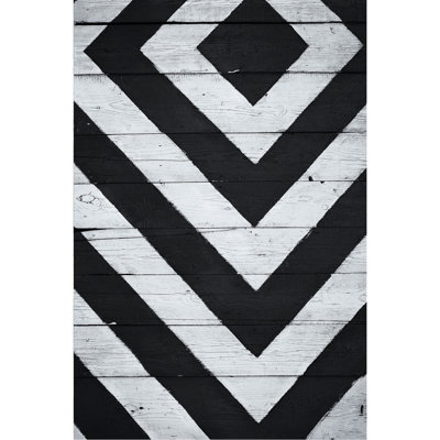 Tapis géométrique en polyester tissé à la machine en noir et blanc