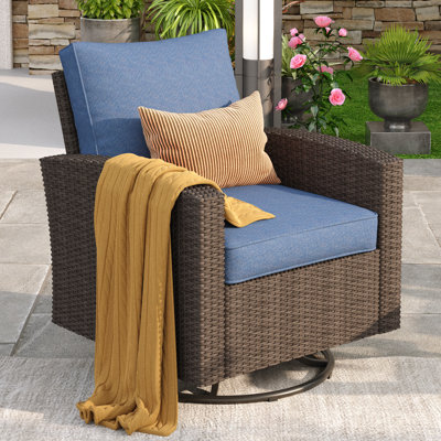 Fauteuil club pivotant avec coussins
