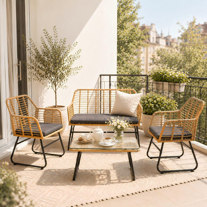 4-Piece PE Rattan Outdoor Seating Group with Tempered Glass Coffee Table