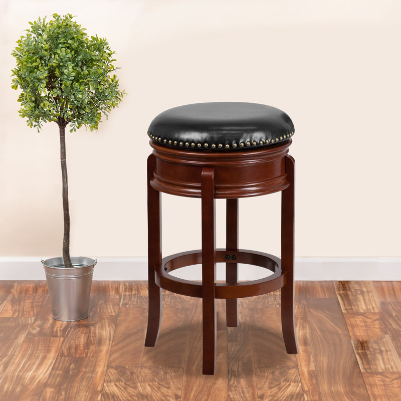 Tabouret à hauteur de comptoir en bois sans dossier de 24 po avec tablier sculpté et siège LeatherSoft Willowridge