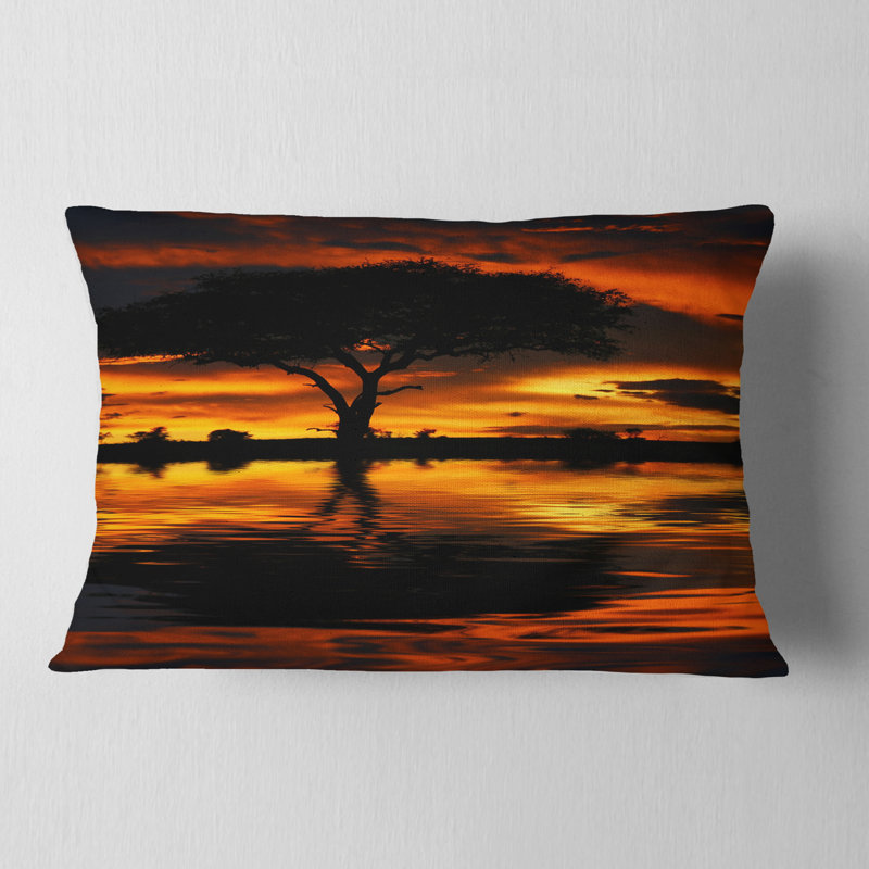 Coussin lombaire silhouette d'arbre et coucher de soleil africain