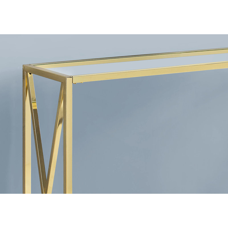 Table de bout de salon contemporain avec plateau en verre transparent épais et pieds en métal, console moderne, base dorée élégante
