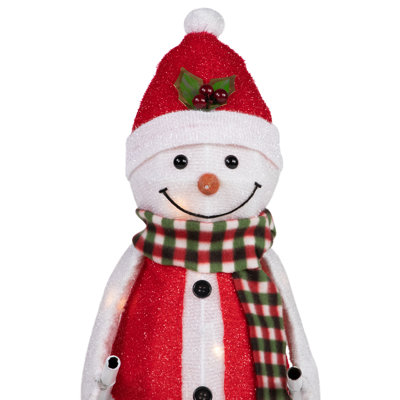 Silhouette de bonhomme de neige skiant