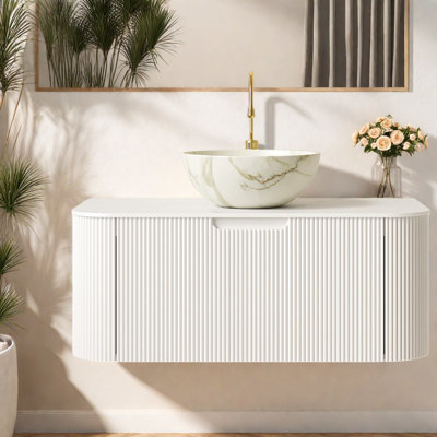 Meuble-lavabo flottant moderne avec rangement, lavabo en céramique et plateau en pierre frittée