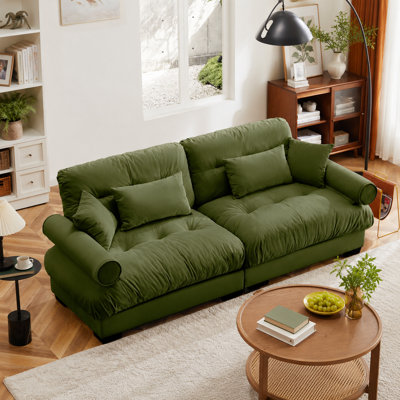 Olive green modern large double sofa with thick velvet armrests and a complimentary lumbar support cushion; versatile for various spaces.