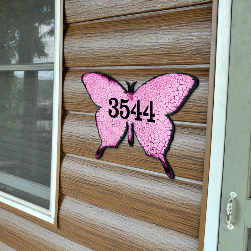 Fixation murale papillon