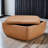 Janice Genuine Leather Upholstered Storage Ottoman