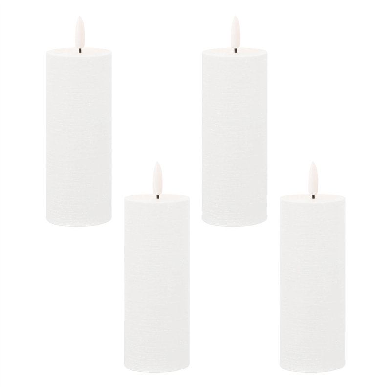 Ensemble de quatre bougies sans flamme blanches sans parfum