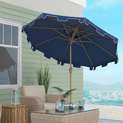 Le parasol de patio de 9 pi bleu foncé ajoute du confort aux espaces extérieurs du jardin, de la terrasse et de la piscine. Inclinaison bleue à 45 degrés pour une protection optimale contre le soleil