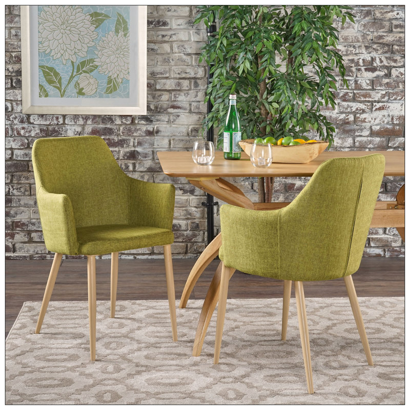 Chaise de salle à manger à soutien profilé avec tissu de haute qualité et structure en fer durable, parfaite pour les intérieurs modernes et peu encombrants.