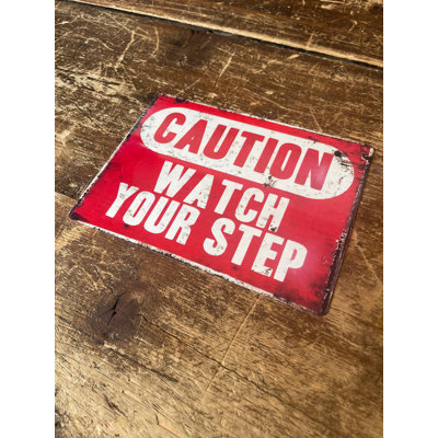 Caution Watch Your Step Sign