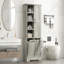 Armoire de rangement pour salle de bain avec portes et tiroirs, panier à linge inclinable, plusieurs espaces de rangement, style autoportant, tablette ouverte, tablette réglable