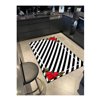 Tapis décoratif à rayures géométriques roses et noires