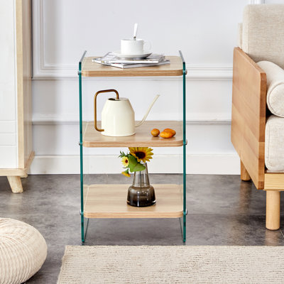 Three-layer bedside cabinet: mdf with wood stickers, tempered glass sides, simple elegant design, ample storage (110 characters)