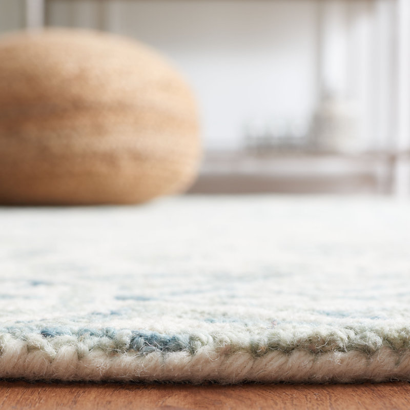 Pimentel Hand Tufted Wool Floral Rug, Rectangle 5' x 8'