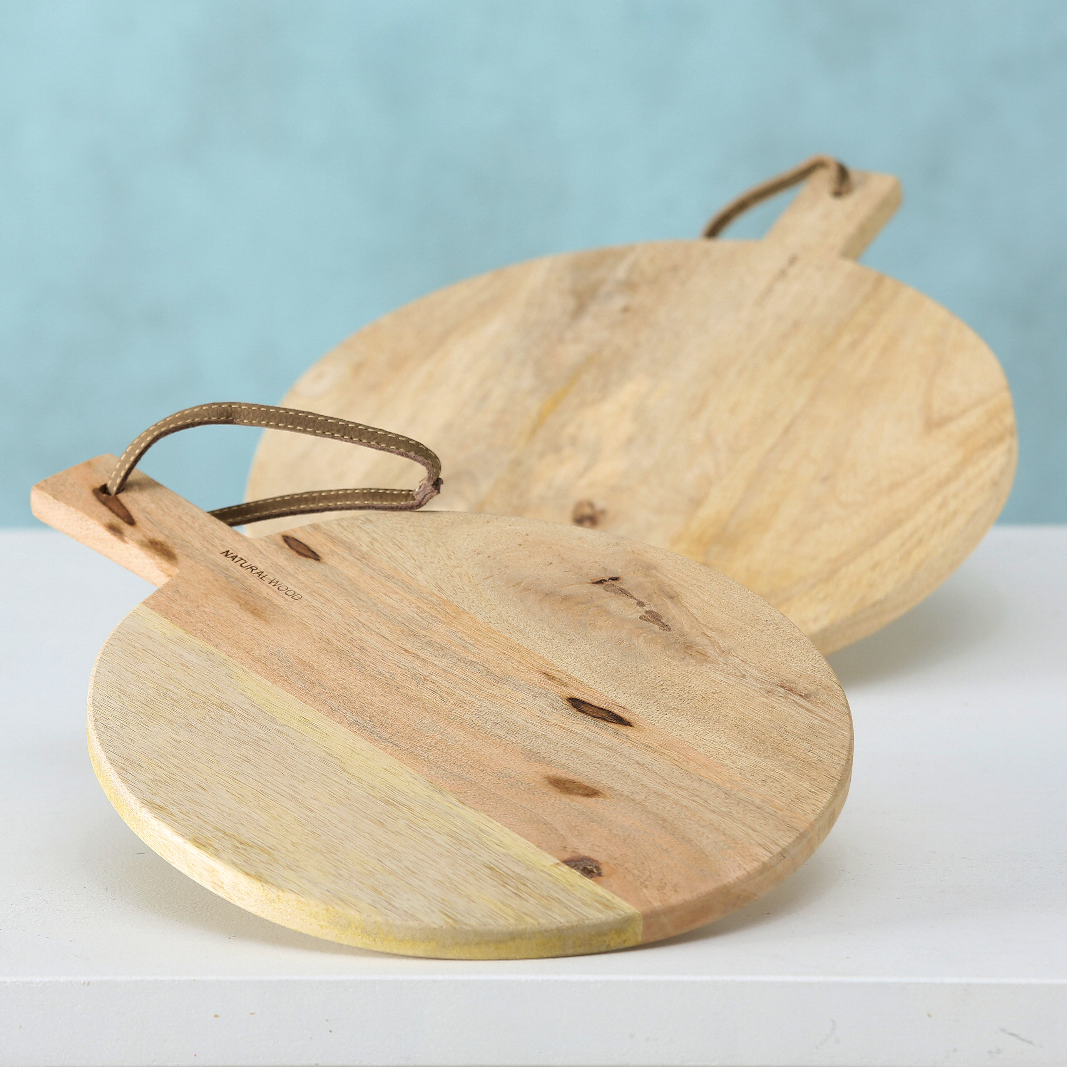 https://assets.wfcdn.com/im/09737897/compr-r85/8959/89590811/whole-house-worlds-strap-paddle-2-piece-mango-wood-cutting-board-set.jpg