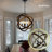Mazhar 20"W 4-Light Wood Globle Chandelier with Metal Accents