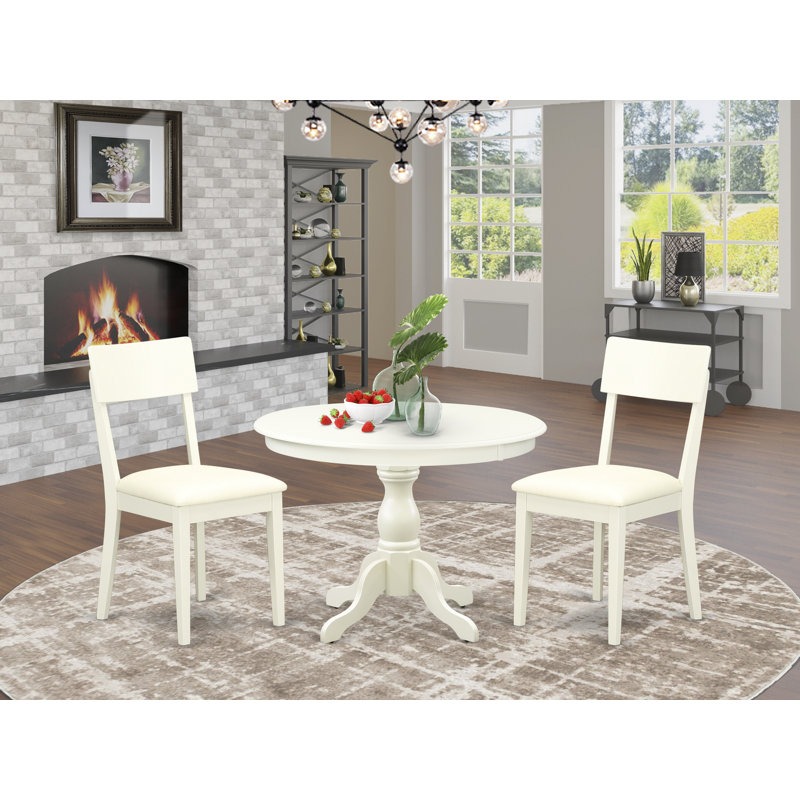 3 Piece Dining Room Furniture Set Contains a Round Kitchen Table with Pedestal and 2 Faux Leather Dining Chairs, Linen White
