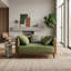 Fauteuil moderne à assise profonde avec revêtement vert olive et accoudoirs bouclés orange