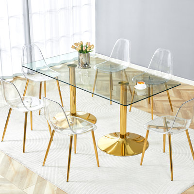 Table 6 places avec table en verre trempé de 71 x 35,4 pouces et chaises en plastique transparent avec pieds en métal doré, design moderne pour les réunions de famille Luxe: peu encombrante et facile à assembler