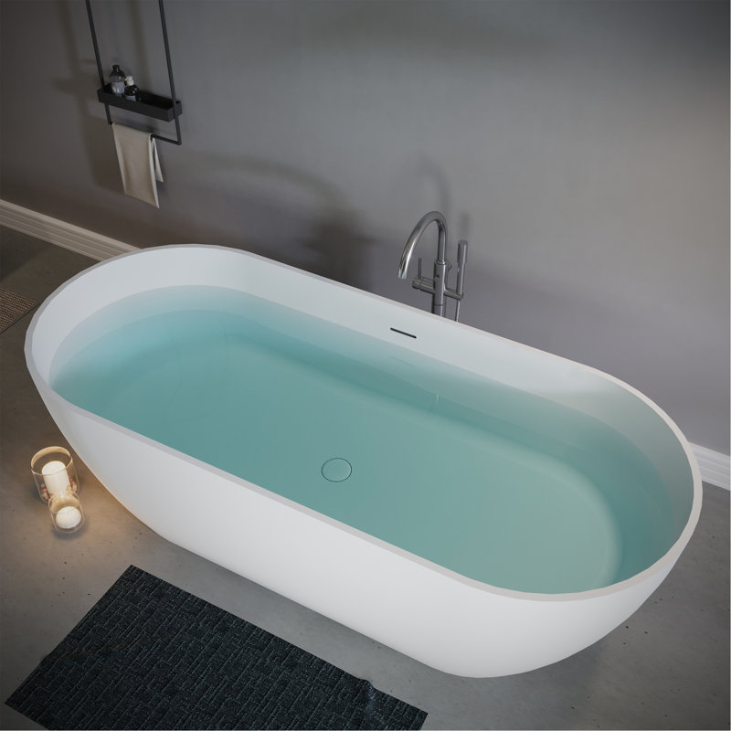 Baignoire autoportante de 69 po en résine de pierre, baignoire de luxe à surface solide avec trop-plein encastré et bonde escamotable, baignoire autoportante élégante autoportante en blanc mat