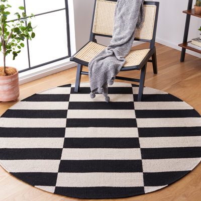 Tapis noir / ivoire en coton fait à la main Alvana