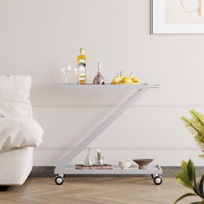 Contemporary Tempered Glass Shelved Bar Cart With Strong Metal, 33.45Lb, Silver Fashionable Rolling Cart, & Iron, Hue by Red Barrel Studio