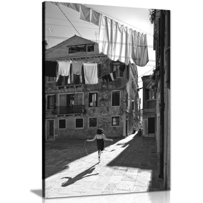 Child Playing In The Street - Wrapped Canvas Print