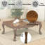 Table basse en chêne cerisier avec pattes.