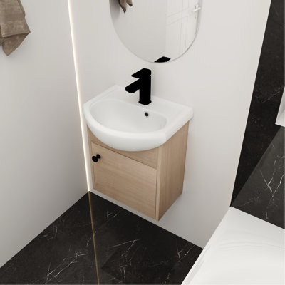 Meuble-lavabo de 18 po avec lavabo en porcelaine. Armoire murale. Bassin en céramique facile à nettoyer. Fabrication en contreplaqué. Meubles au fini chêne. Contreplaqué. Finition. Élégant et pratique