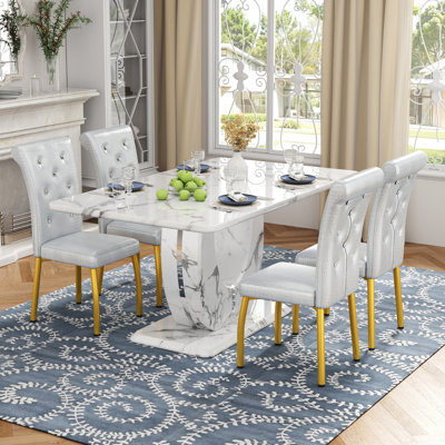 Modern 63" Faux Marble Dining Table Set with Spring-Supported PU Leather Chairs