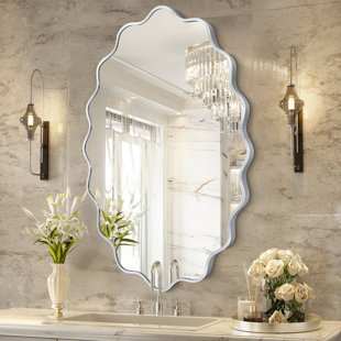 Miroir mural élégant et ovale ondulé