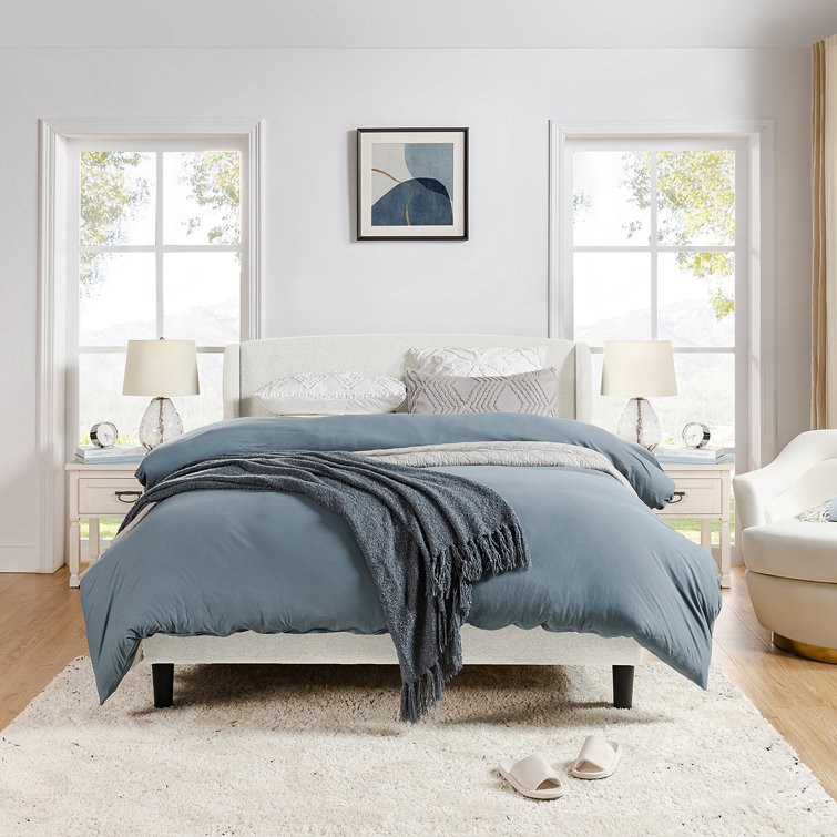 Zylan Upholstered Wingback Platform Bed