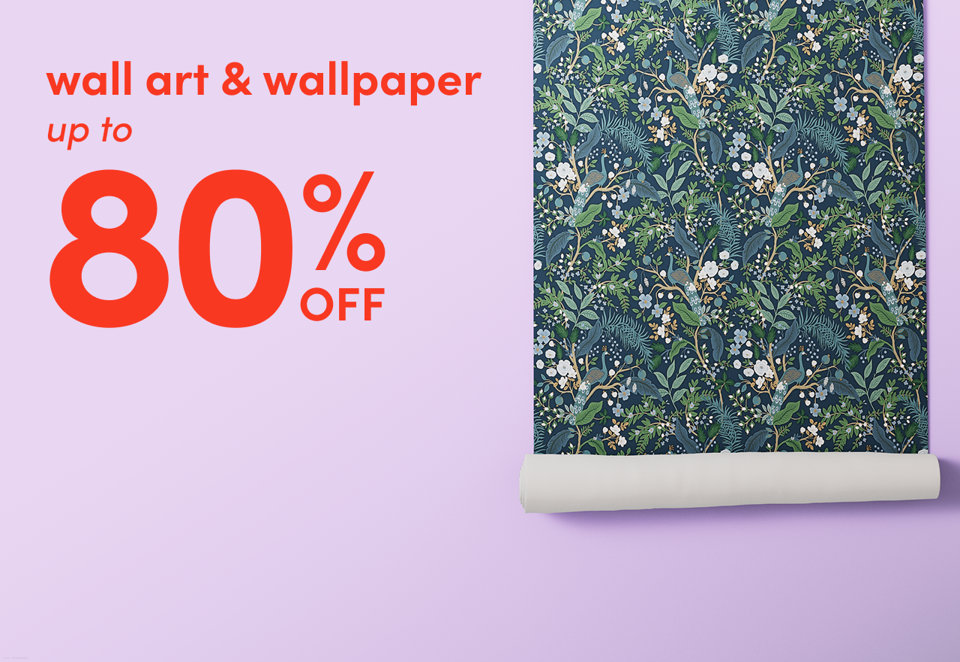 Wall art and wallpaper up to 80% off against a light purple background with a roll of floral patterned wallpaper.