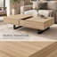 Table basse de style Mid-Century avec plateau coulissant, rangement dissimulé et plateau extensible en bois naturel