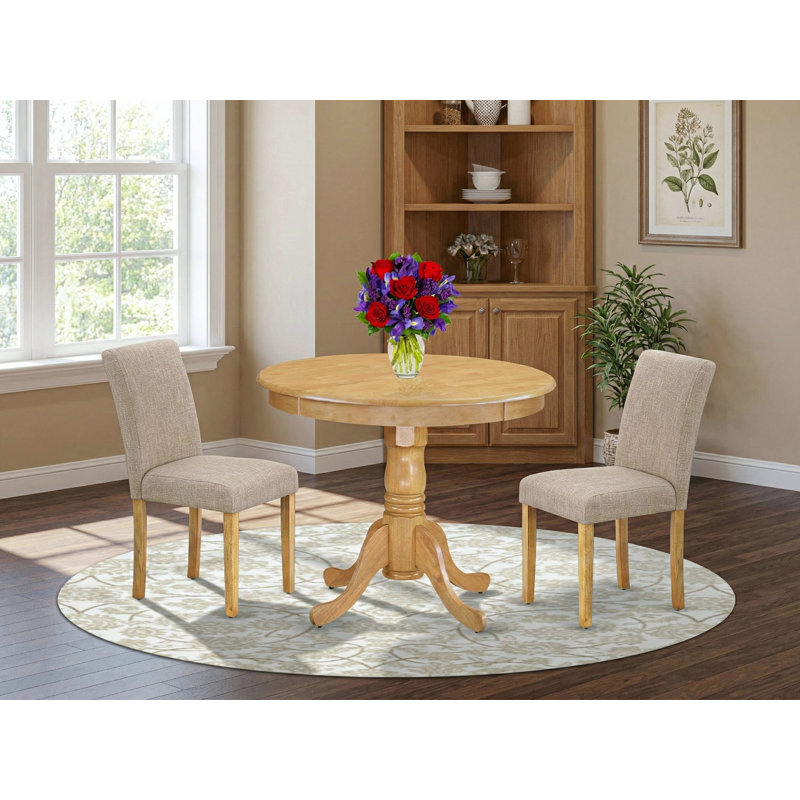 Ensemble de coin repas 3 pièces pour petits espaces comprenant une table de salle à manger ronde avec piédestal et 2 chaises rembourrées en tissu de lin brun clair, chêne