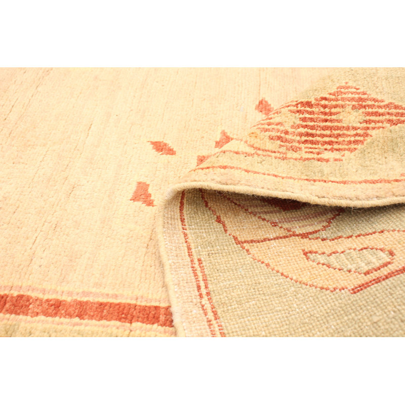 Tapis orange / ivoire en laine noué à la main