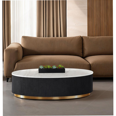 Table basse ovale de style contemporain avec plateau en marbre pour le salon