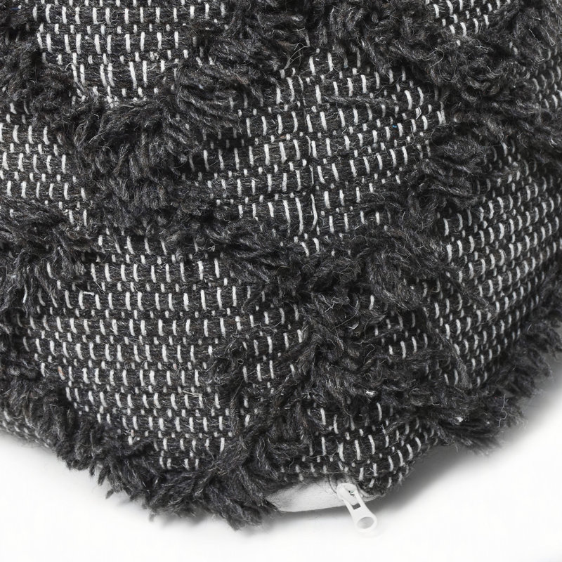 Pouf en laine et coton Jumanji