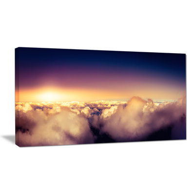 " Blue Sky Over Clouds "